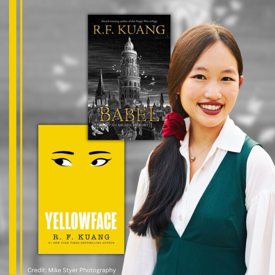 Woman wearing green vest standing next to her yellow book cover