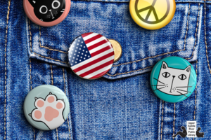 denim jacket with button of cat, flag, peace sign, dog, paw print