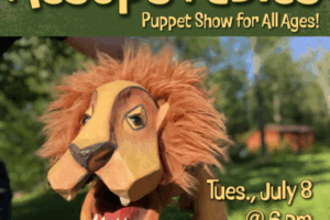 puppert lion with decorative text