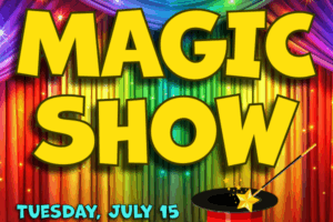 magic hat in front of colorful curtains