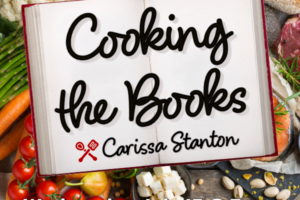 cook book open with a variety of vegetables and decorative text