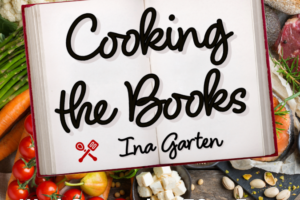 open book with decorative text and vegetables, nuts and grains