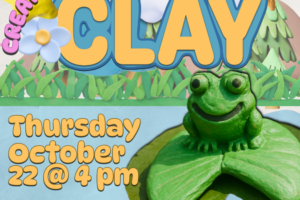 clay frog on lily pad and decorative text